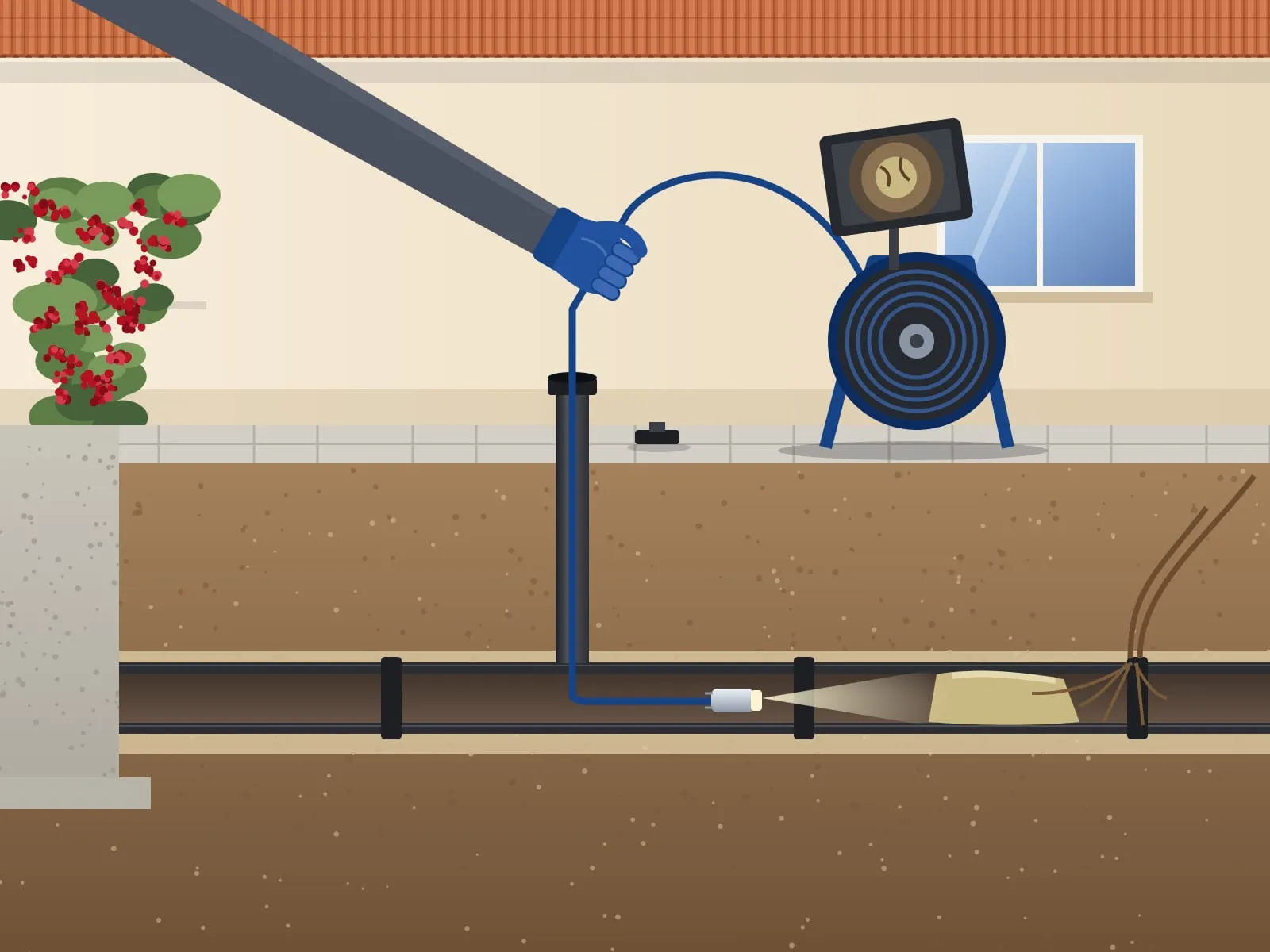 Illustration of a gloved hand feeding an inspection camera down a cleanout, the cutaway drain below showing grease and roots ahead